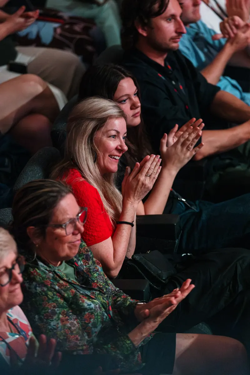 The Signal audience laughing.